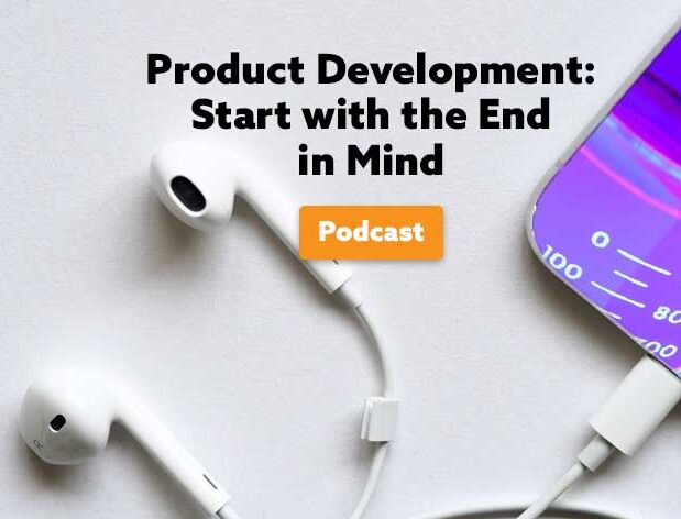 iPhone connected to headphones with beakers on screen and 