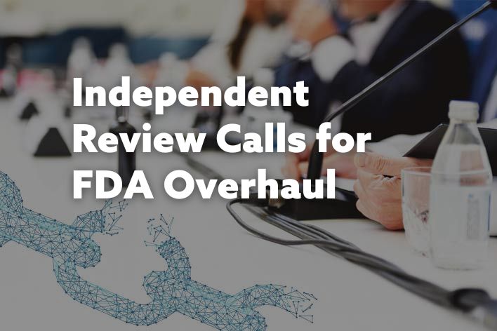 FDA members at table receiving results of independent review