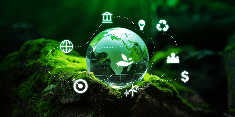 Crystal earth surrounded by sustainability icons on a gradient green background